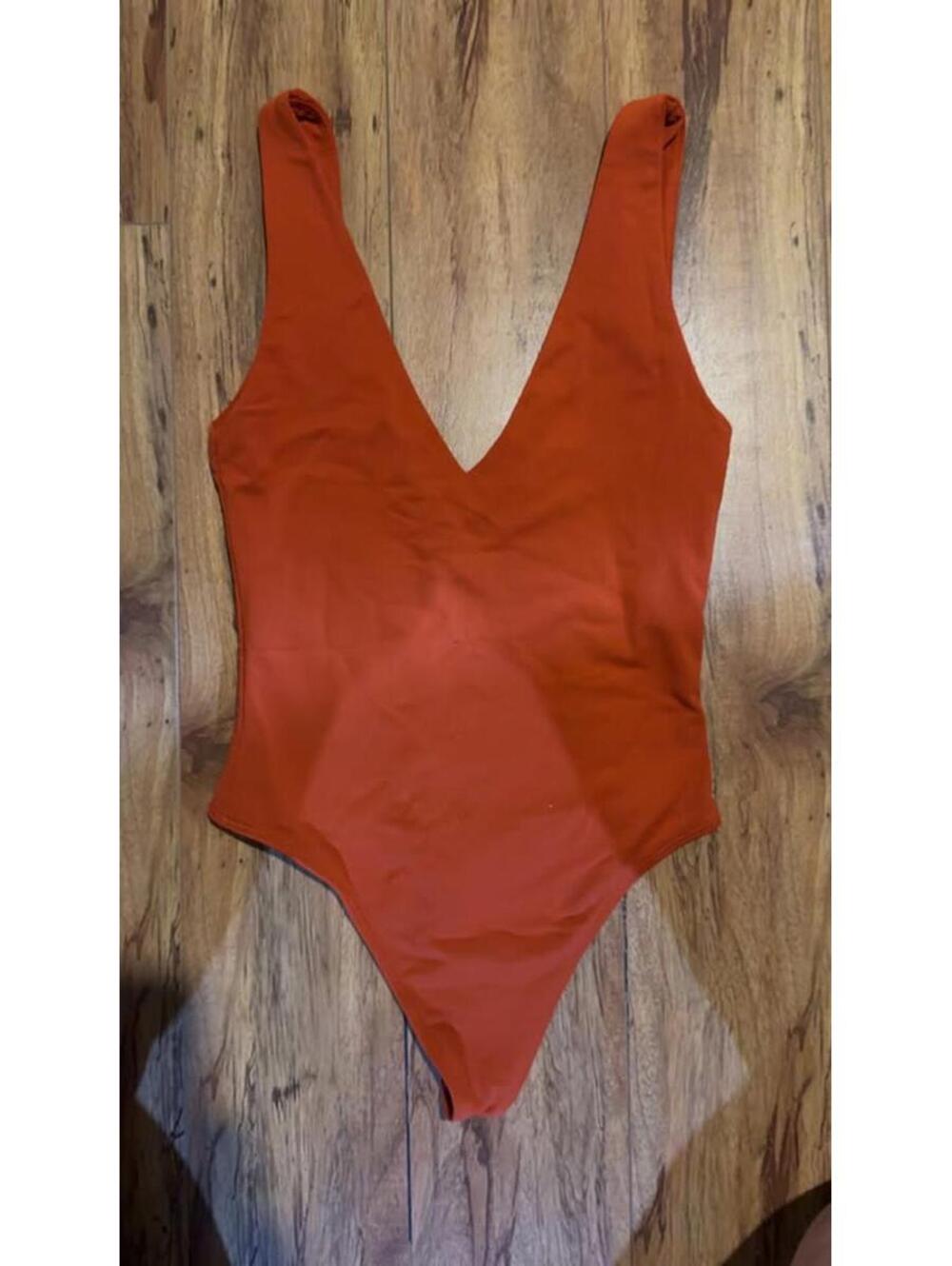 Babaton Orange One-Piece bodysuit new Size XS